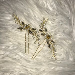 Two pearl hair pins